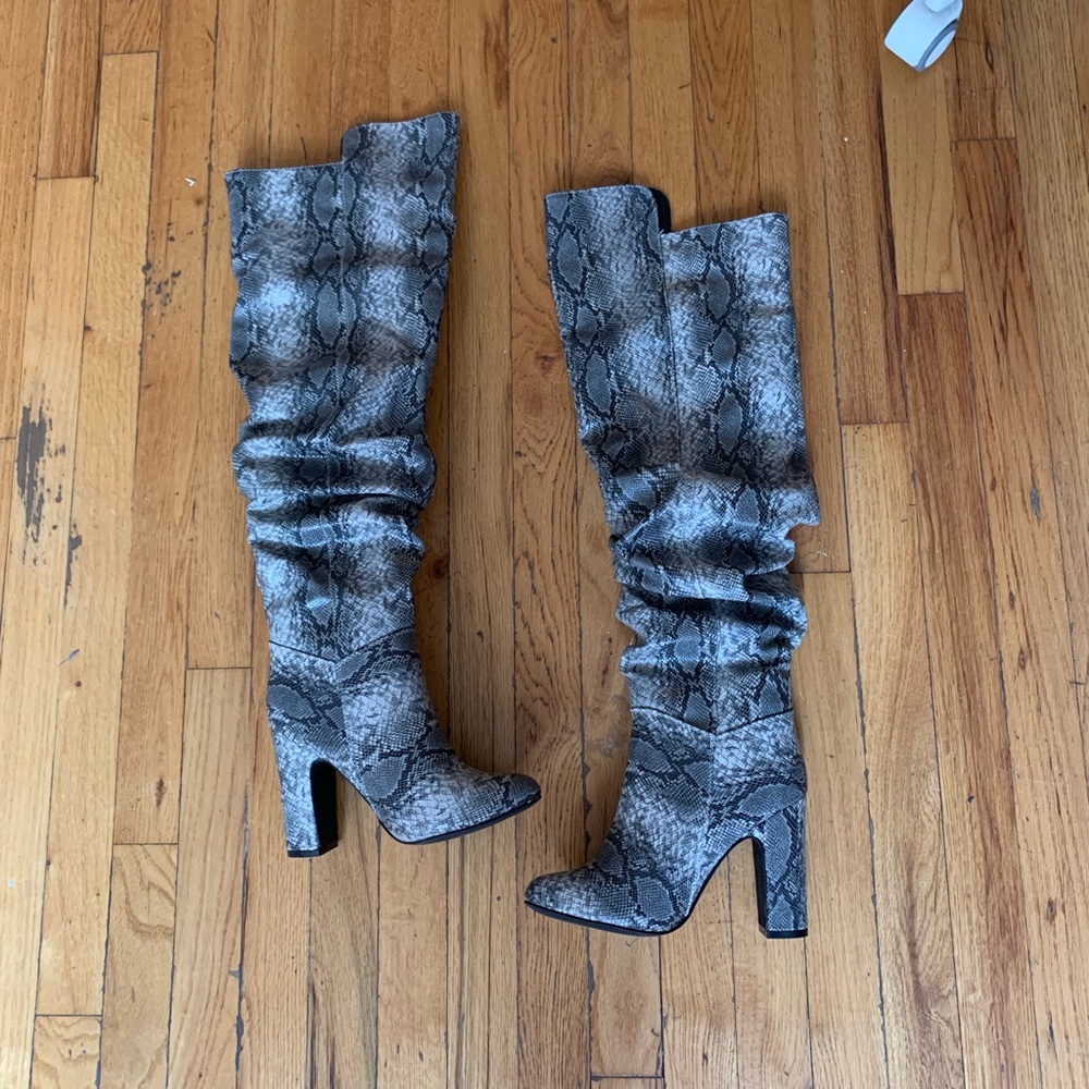 Snakeskin over the knee boots